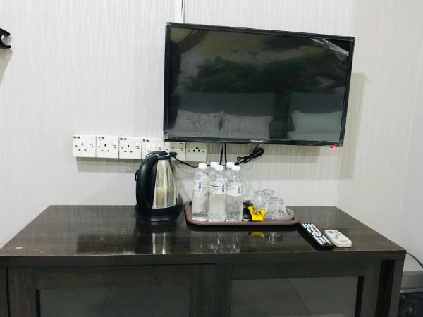 Home Inn Hotel : photo 1 de la chambre chambre lits jumeaux avec salle de bains privative