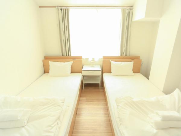 コインズホステル天神ペット宿泊可 : photo 5 de la chambre chambre lits jumeaux deluxe