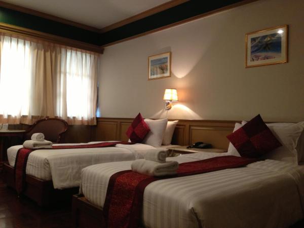 Suda Palace : photo 4 de la chambre chambre lits jumeaux deluxe