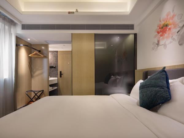 Paco Hotel Jiangtai Lu Metro Guangzhou ---Free Shuttle Bus For CantonFair : photo 3 de la chambre superior kingbed room
