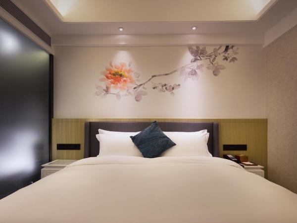 Paco Hotel Jiangtai Lu Metro Guangzhou ---Free Shuttle Bus For CantonFair : photo 2 de la chambre superior kingbed room
