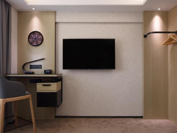 Paco Hotel Jiangtai Lu Metro Guangzhou ---Free Shuttle Bus For CantonFair : photo 4 de la chambre executive twinbed room