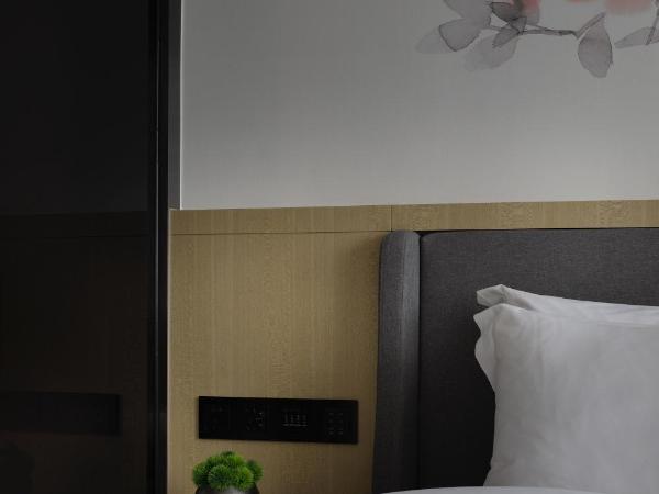 Paco Hotel Jiangtai Lu Metro Guangzhou ---Free Shuttle Bus For CantonFair : photo 6 de la chambre chambre lit queen-size deluxe