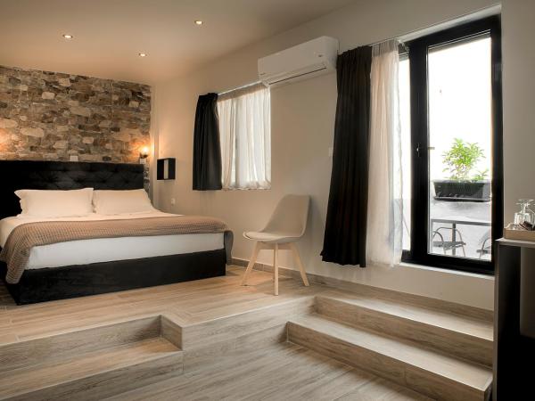 Pallada Athens boutique rooms & apartments : photo 3 de la chambre chambre lit king-size