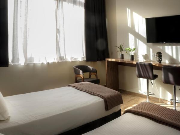 Pallada Athens boutique rooms & apartments : photo 4 de la chambre chambre double deluxe avec 2 lits jumeaux