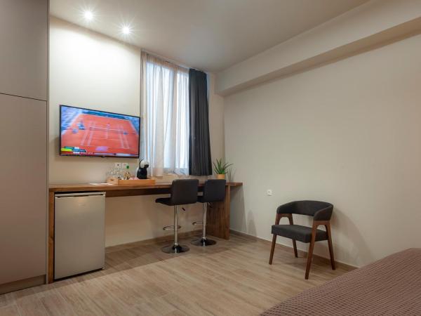 Pallada Athens boutique rooms & apartments : photo 7 de la chambre chambre deluxe double ou lits jumeaux