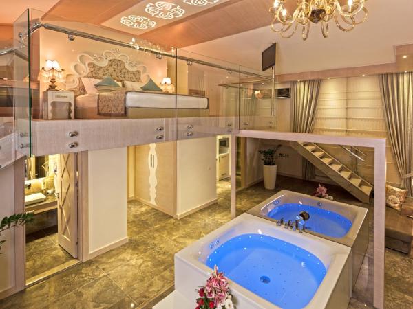 Xperia Saray Beach Hotel : photo 1 de la chambre chambre lit king-size