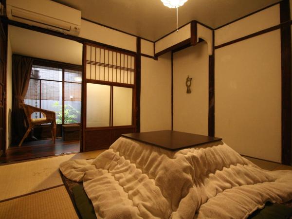 HARUYA Umekoji : photo 1 de la chambre chambre lits jumeaux - vue sur jardin