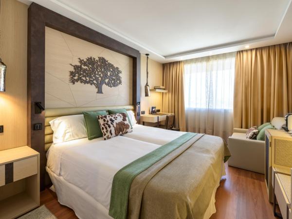 Santemar : photo 2 de la chambre chambre triple deluxe