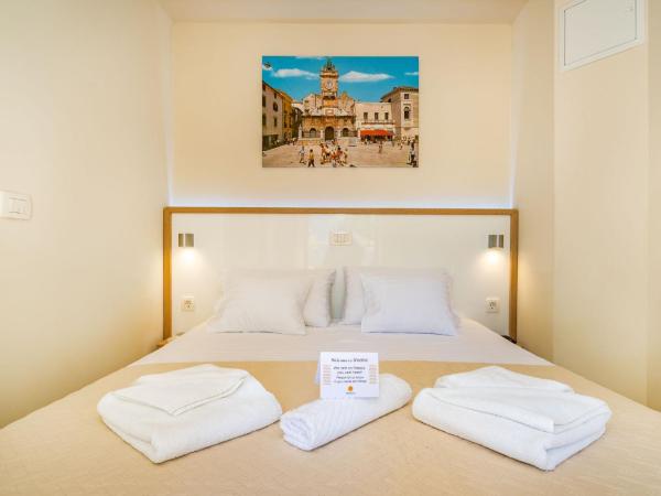 Idassa Palace rooms : photo 3 de la chambre chambre double ou lits jumeaux - bâtiment annexe