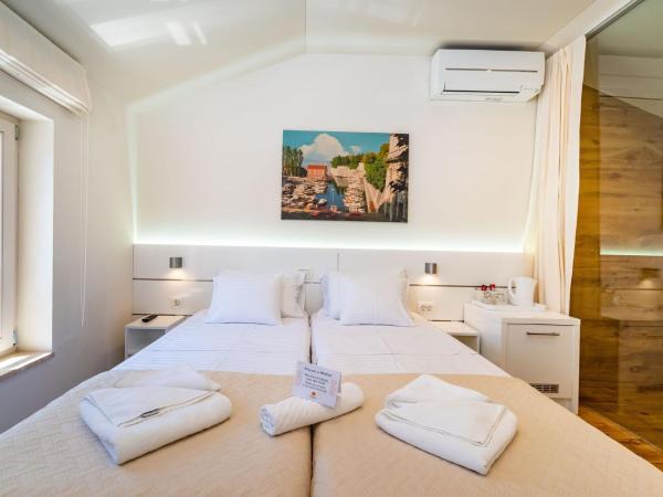 Idassa Palace rooms : photo 10 de la chambre chambre double ou lits jumeaux