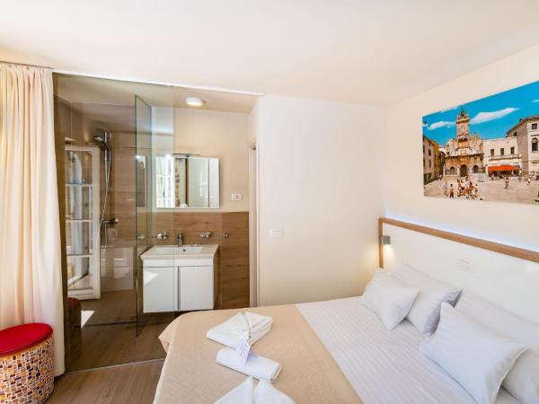 Idassa Palace rooms : photo 5 de la chambre chambre double ou lits jumeaux - bâtiment annexe