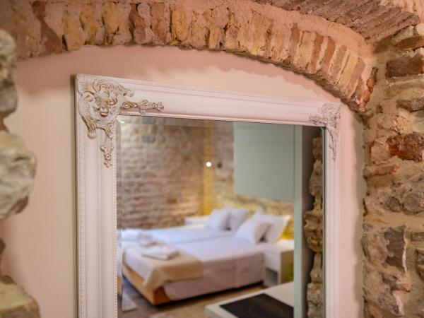 Idassa Atrium rooms : photo 7 de la chambre chambre double avec lit d'appoint