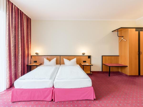 Andante Hotel Dresden : photo 2 de la chambre chambre triple avec balcon