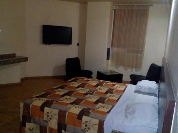 Motel Paraiso Suites : photo 4 de la chambre suite lit king-size