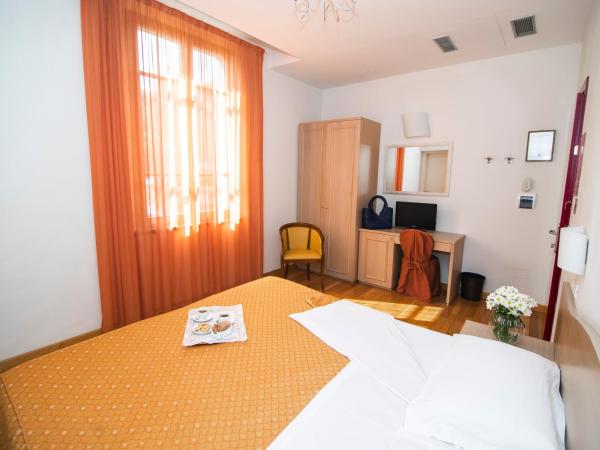 Hotel La Colonna : photo 5 de la chambre chambre double côté jardin