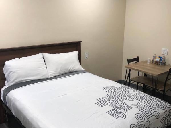 24 Hours Motel : photo 1 de la chambre chambre lit queen-size 