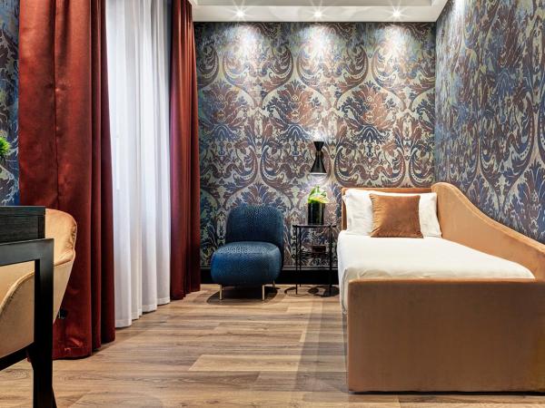 Hotel American-Dinesen : photo 6 de la chambre chambre quadruple