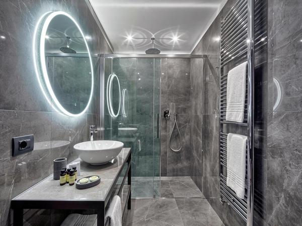 Hotel American-Dinesen : photo 9 de la chambre chambre quadruple