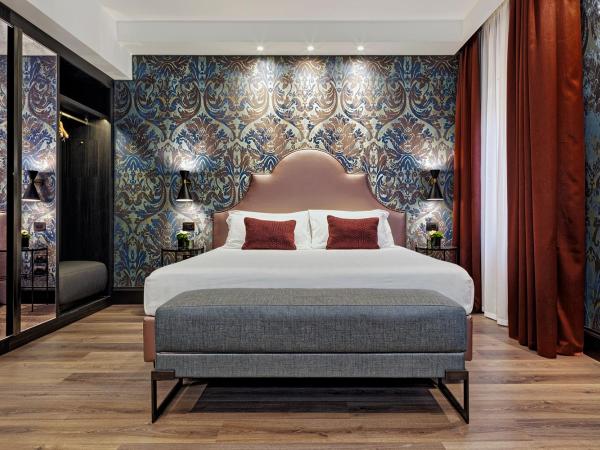 Hotel American-Dinesen : photo 1 de la chambre chambre quadruple