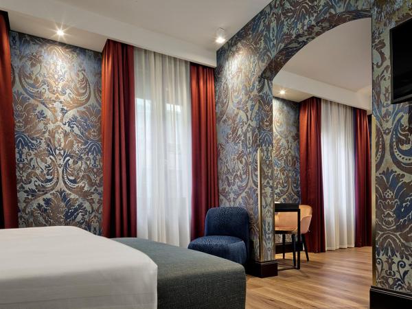 Hotel American-Dinesen : photo 8 de la chambre chambre quadruple
