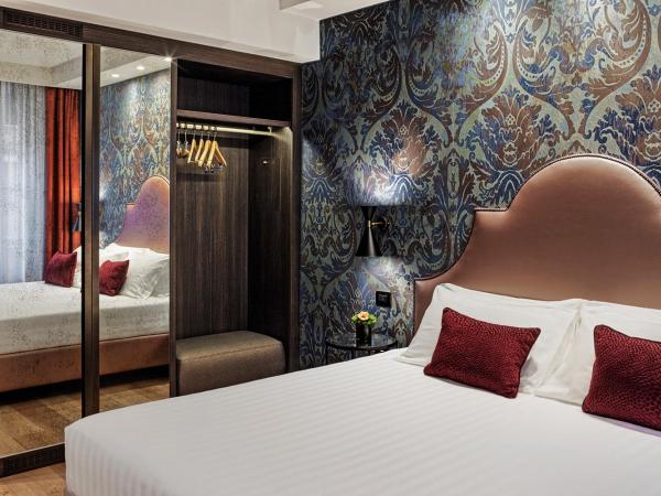 Hotel American-Dinesen : photo 2 de la chambre chambre quadruple