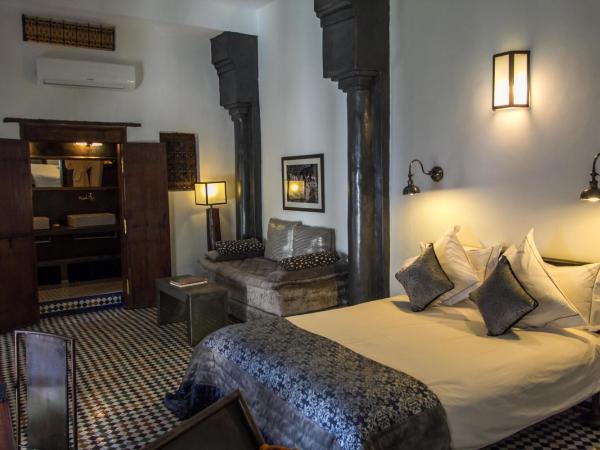 Riad Laaroussa : photo 2 de la chambre suite grise (2 adultes)