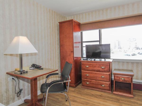 Canadas Best Value Inn Chinook Station : photo 9 de la chambre studio lit queen-size avec kitchenette - non-fumeurs