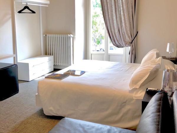 Bue Nero Suites Verona : photo 10 de la chambre chambre triple supérieure