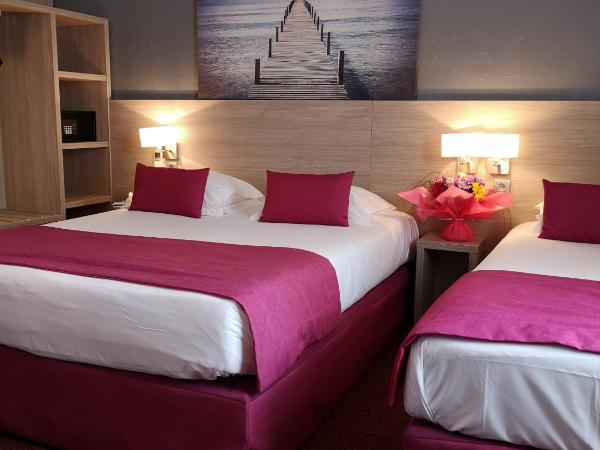 Atoll Hotel restaurant : photo 6 de la chambre chambre triple (1 lit double et 1 lit simple)