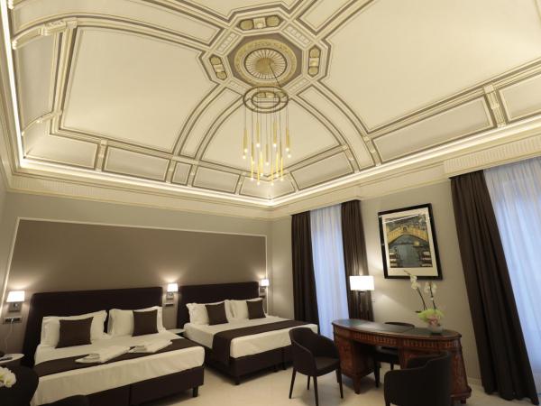 ETNEA STYLE CATANIA LUXURY ROOMS : photo 2 de la chambre chambre exécutive avec 2 lits queen-size