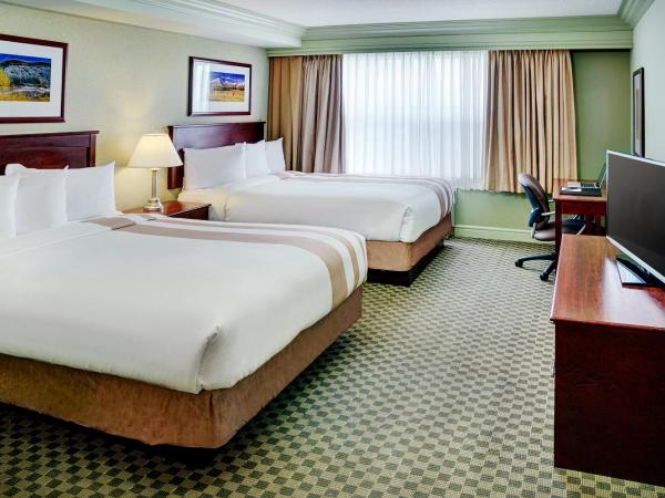 Chateau Nova Kingsway : photo 1 de la chambre chambre avec 2 grands lits queen-size