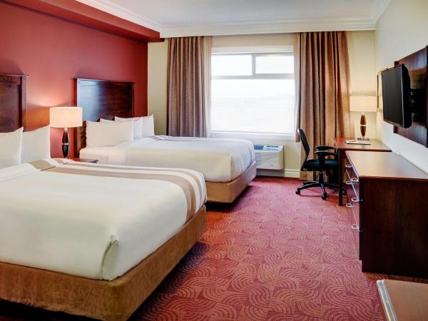 Chateau Nova Yellowhead : photo 1 de la chambre chambre avec 2 grands lits queen-size 