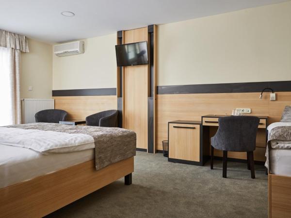 Gold House Pension : photo 1 de la chambre chambre supérieure lit queen-size