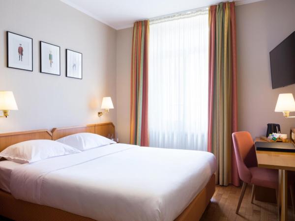 Hotel Perrin - former Carlton : photo 3 de la chambre chambre double