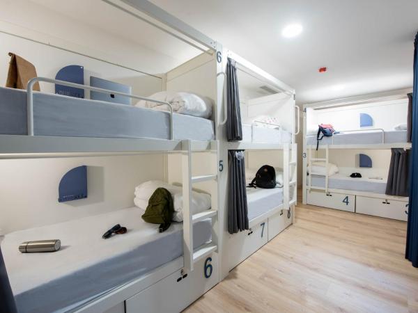room00 Gran Vía Hostel : photo 1 de la chambre lit dans dortoir mixte de 8 lits 