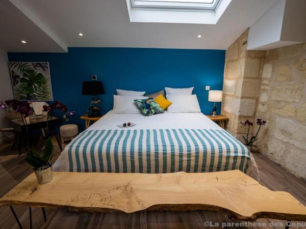 La Parenthèse des Capucins - Maison d'hôtes Bordeaux : photo 9 de la chambre chambre lit king-size avec baignoire spa