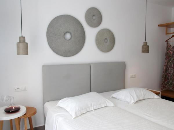 Casabella : photo 10 de la chambre chambre double ou lits jumeaux standard - demi sous-sol