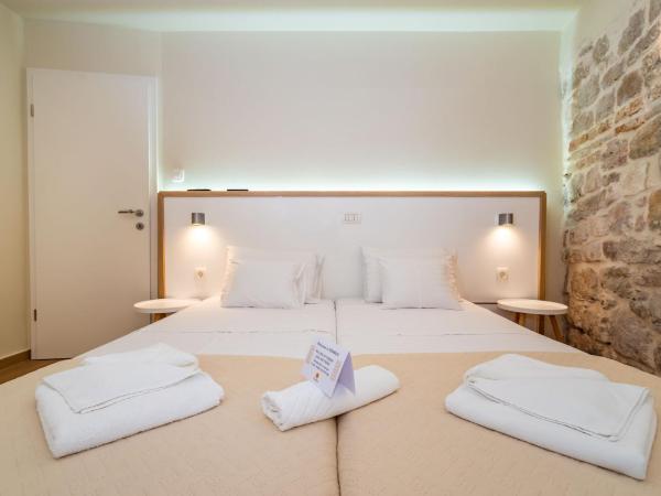 Idassa Palace rooms : photo 1 de la chambre chambre double ou lits jumeaux - bâtiment annexe