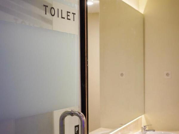 The Capsule Malioboro : photo 2 de la chambre lit dans dortoir pour hommes