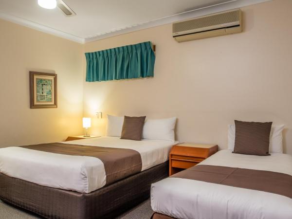 Aspley Carsel Motor Inn : photo 2 de la chambre chambre lits jumeaux de luxe avec cuisine