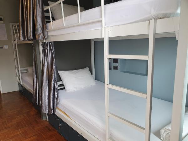 The August Hostel : photo 3 de la chambre chambre quadruple avec salle de bains commune (lits superposés)
