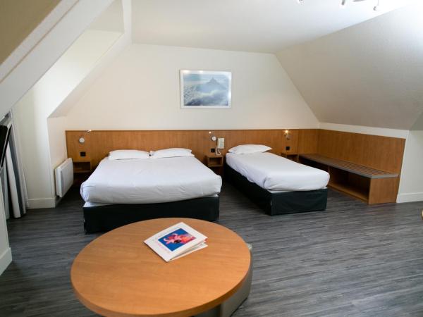 Hôtel Vert : photo 6 de la chambre chambre quadruple avec baignoire