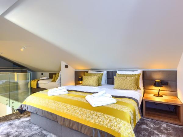 Bel Residence : photo 7 de la chambre suite de luxe avec terrasse et bain à remous