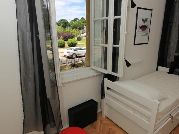 The Hostel : photo 2 de la chambre lit simple en dortoir mixte - vue sur jardin