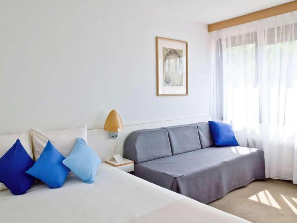 Novotel Poznań Malta : photo 5 de la chambre chambre double standard avec canapé