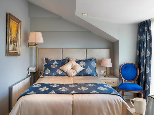 Güner Business Hotel : photo 7 de la chambre chambre double deluxe (2 adultes + 1 enfant)