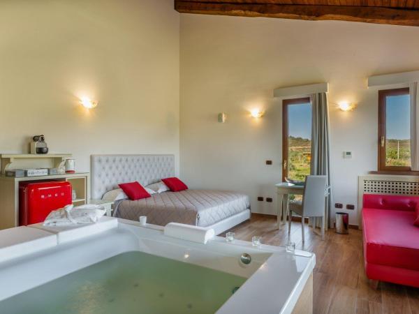 Hotel Sa Cheya Relais & Spa : photo 5 de la chambre suite lit king-size avec baignoire spa