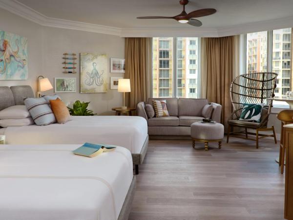 Pelican Grand Beach Resort, a Noble House Resort : photo 2 de la chambre chambre quadruple