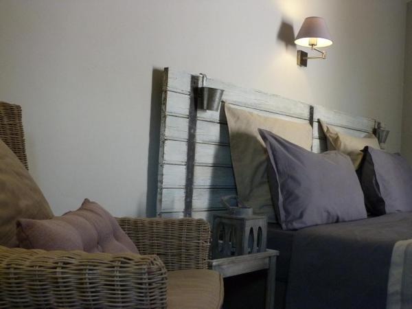 Les Persiennes : photo 2 de la chambre chambre supérieure - rez-de-chaussée
